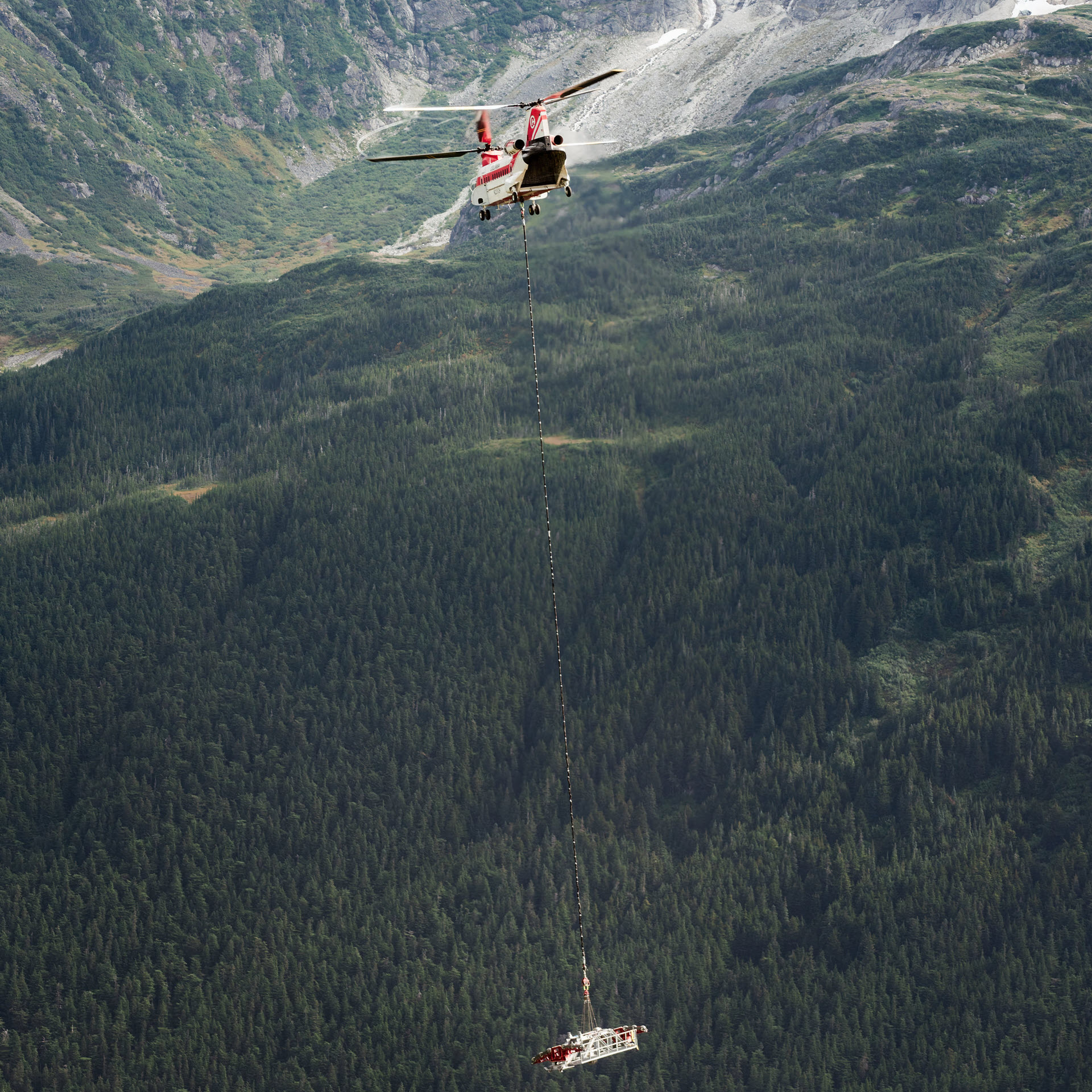 A helicopter dismantling the tower at Cable Crane Hill